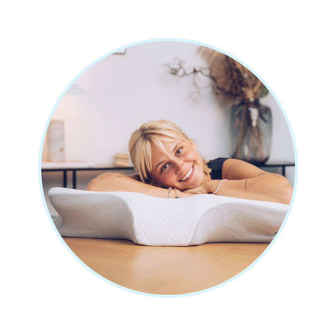 Happy customer smiling with the Cervical Pillow
